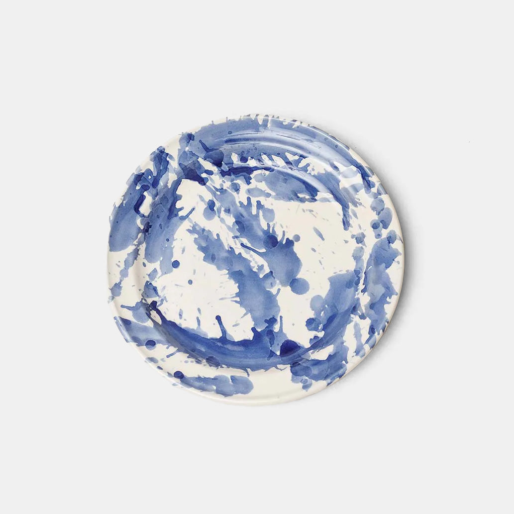 Assiette à dessert bleue en verre éclaboussé