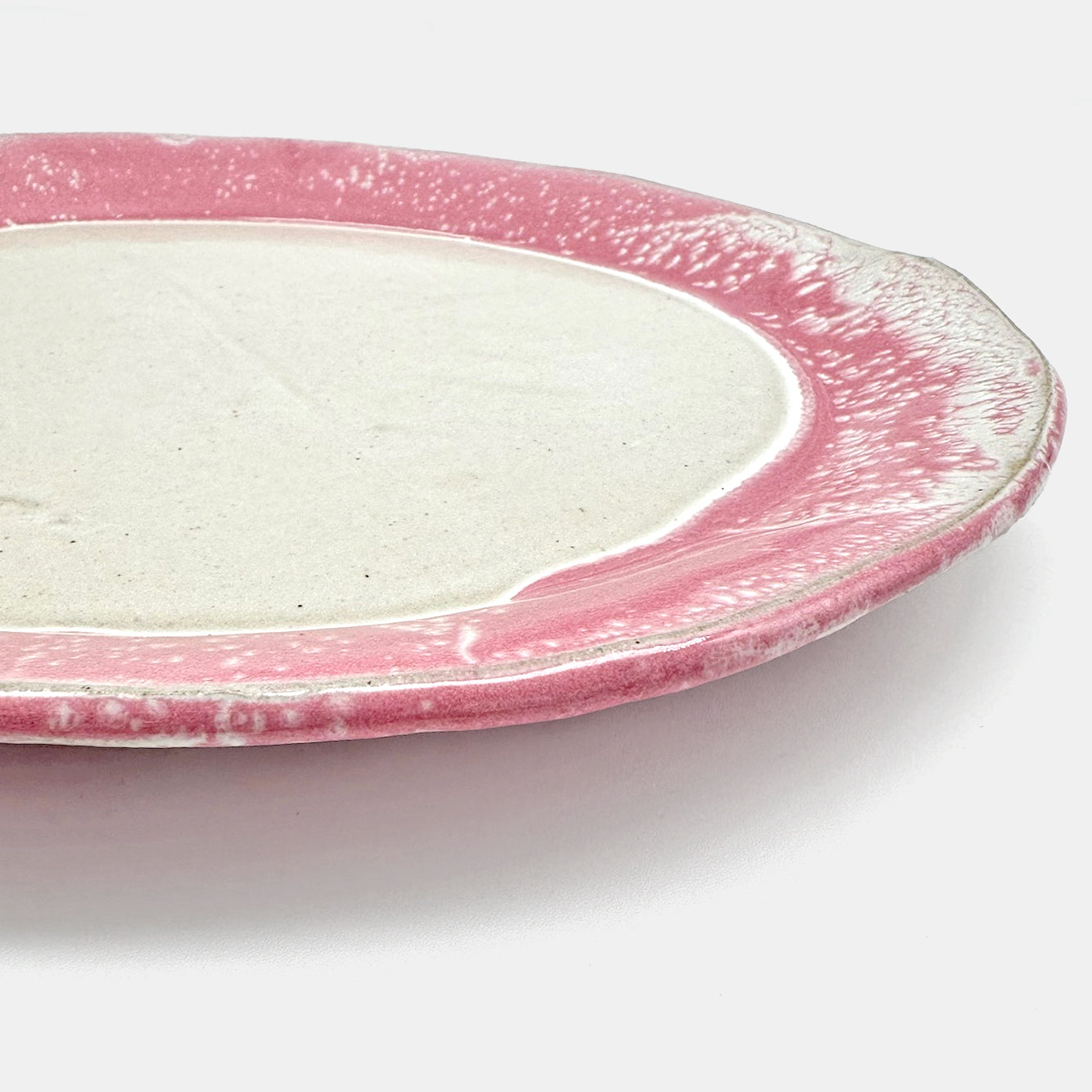 Plat de service rond rose