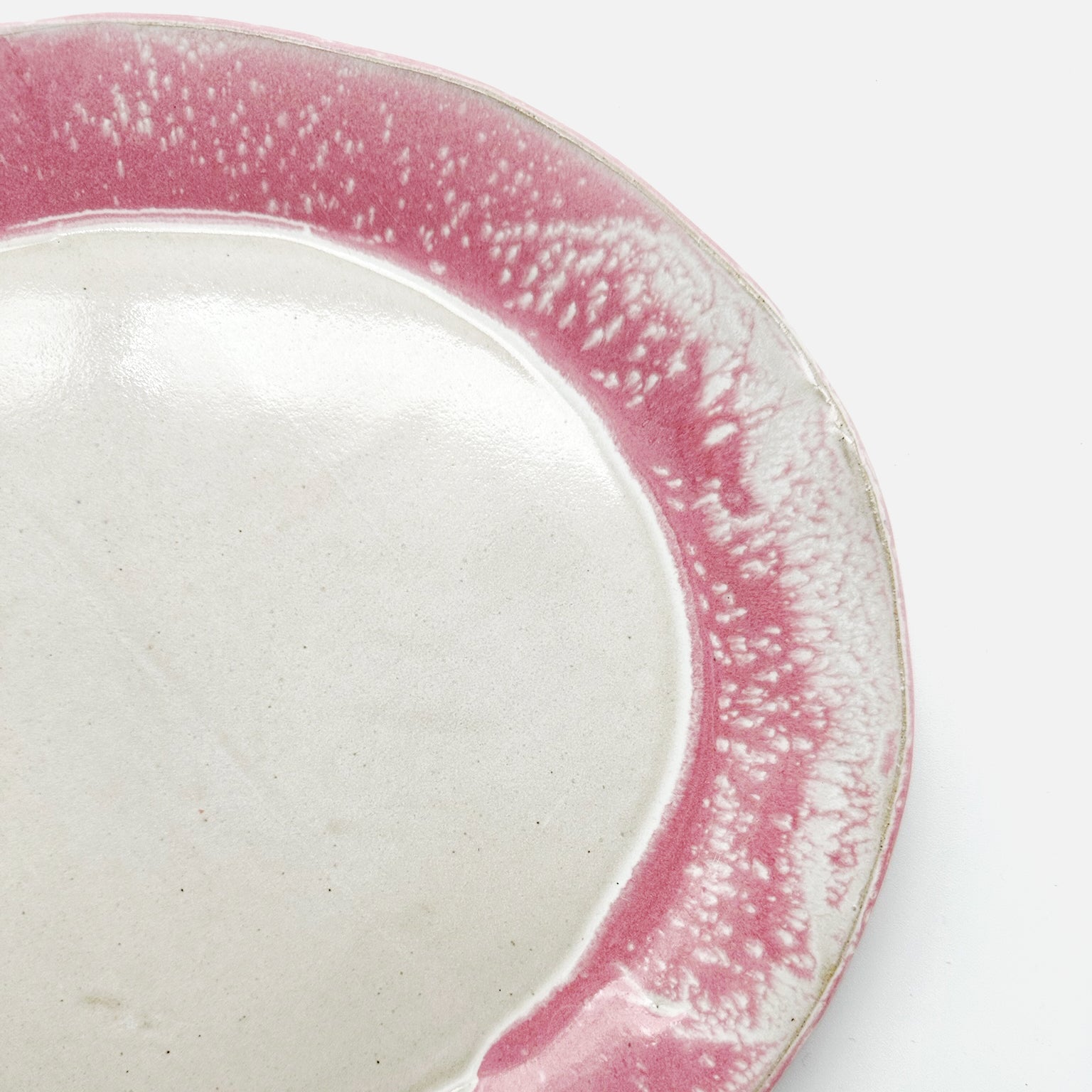 Plat de service rond rose