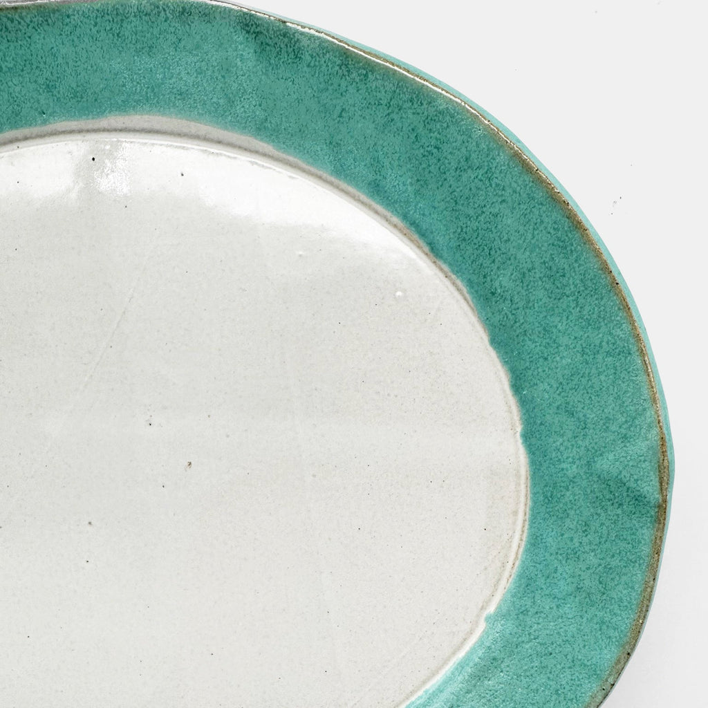 Plat de service arrondi bleu sarcelle