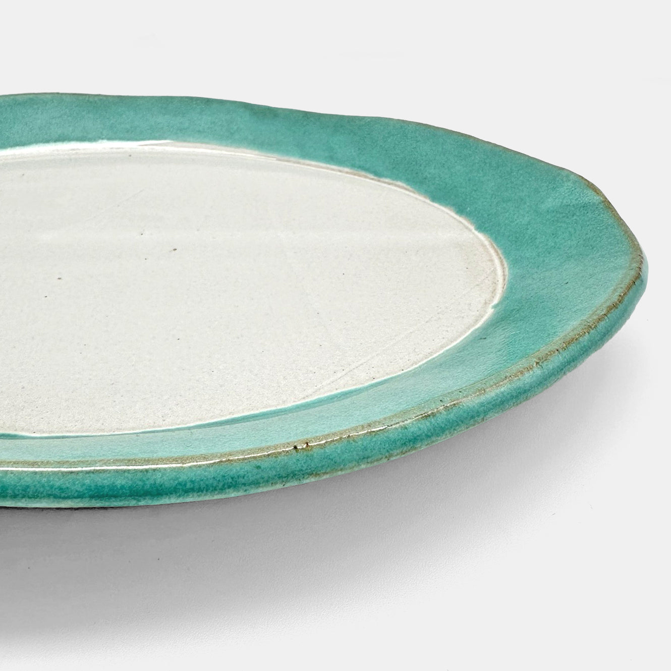 Plat de service arrondi bleu sarcelle
