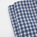 Serviette en lin à petits carreaux bleus