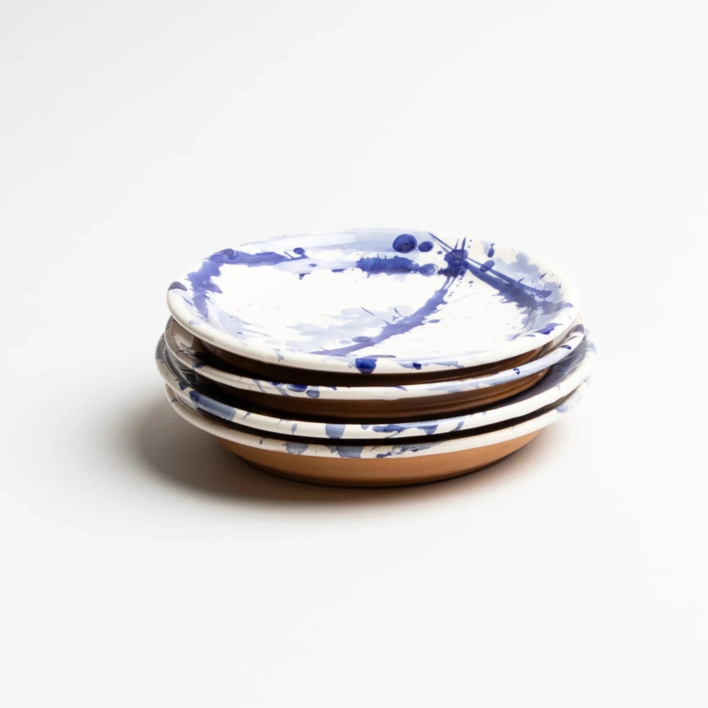 Assiette à dessert bleue en verre éclaboussé